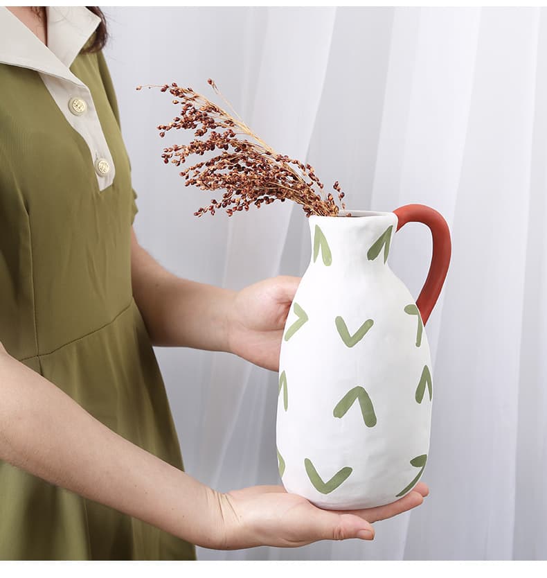 Tall cream milk pot ceramic vase held with dried stems
