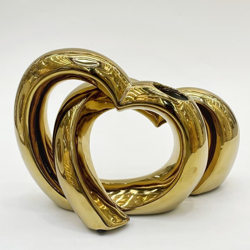 Layered platinum loop ceramic vase profile with open center