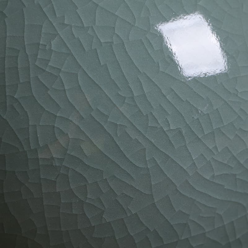 Close view of the celadon crackle glaze surface