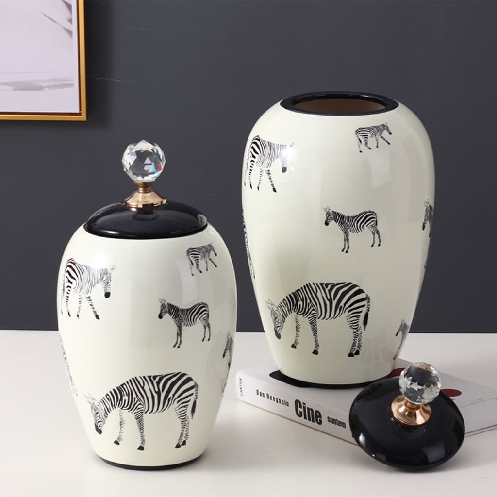 Animal motif ceramic decorative canisters styled on a console