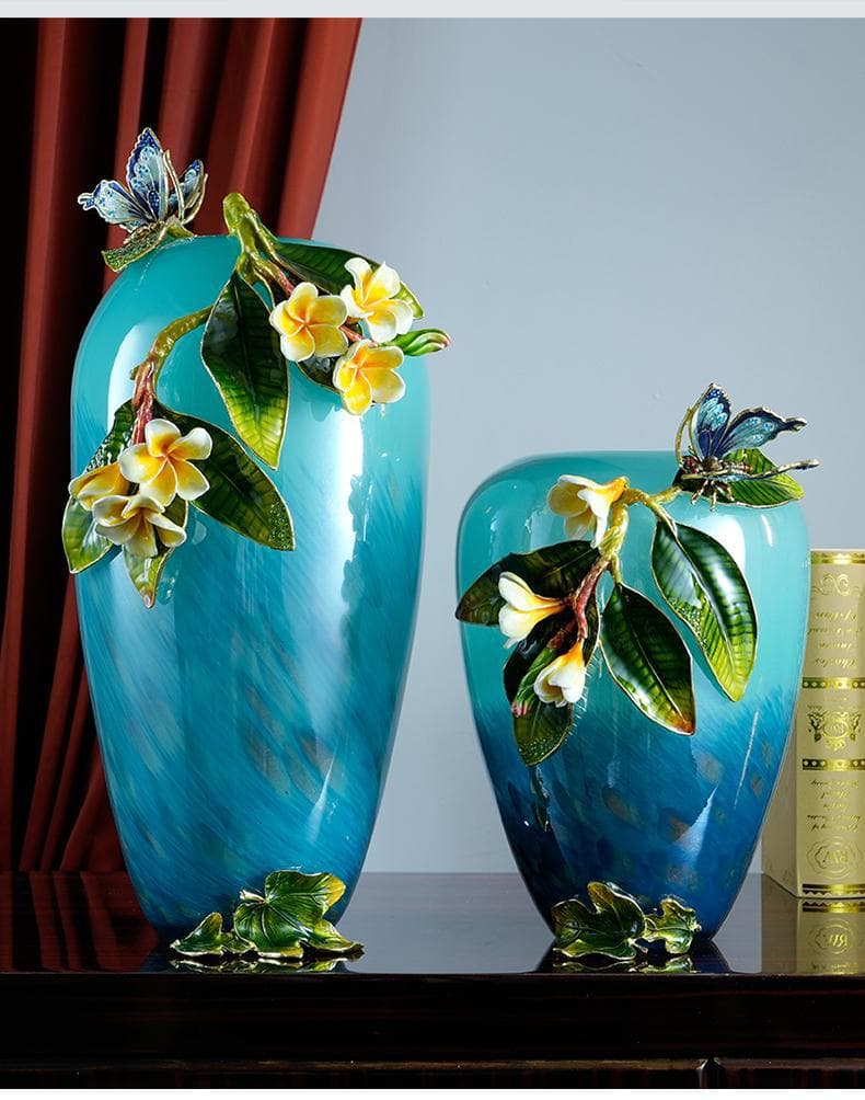 Turquoise enamel glass vase pair with raised flower and bird details